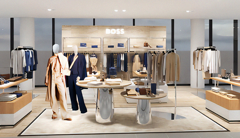 Eingangsbereich einens Kleidungsgeschäftes mit BOSS Logo im Hintergrund (Foto)